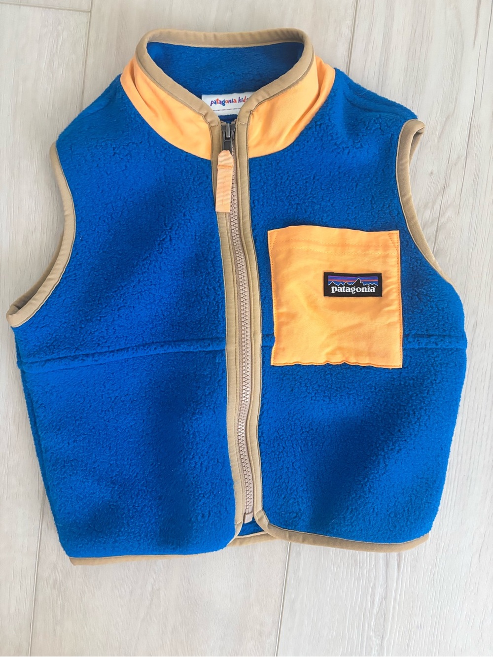 Patagonia Kids Blue Fleece Vest with Yellow Pocket & Tan Trim